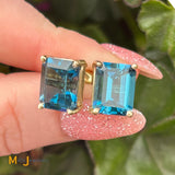 14K Yellow Gold 8.94ctw Emerald Cut Blue Topaz Stud Earrings