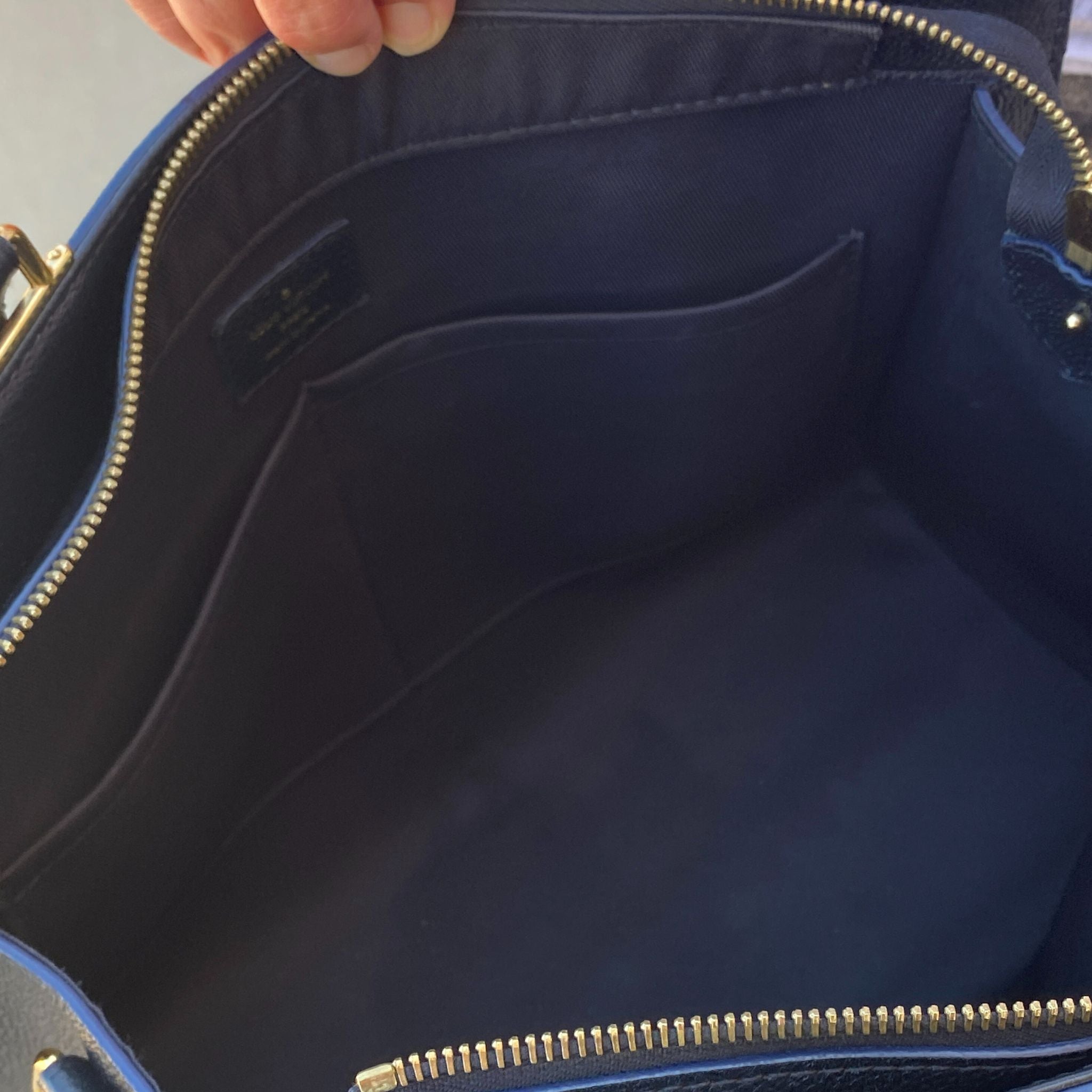 Louis Vuitton Sully Empreinte MM Handbag in Noir (Black)