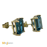 14K Yellow Gold 8.94ctw Emerald Cut Blue Topaz Stud Earrings