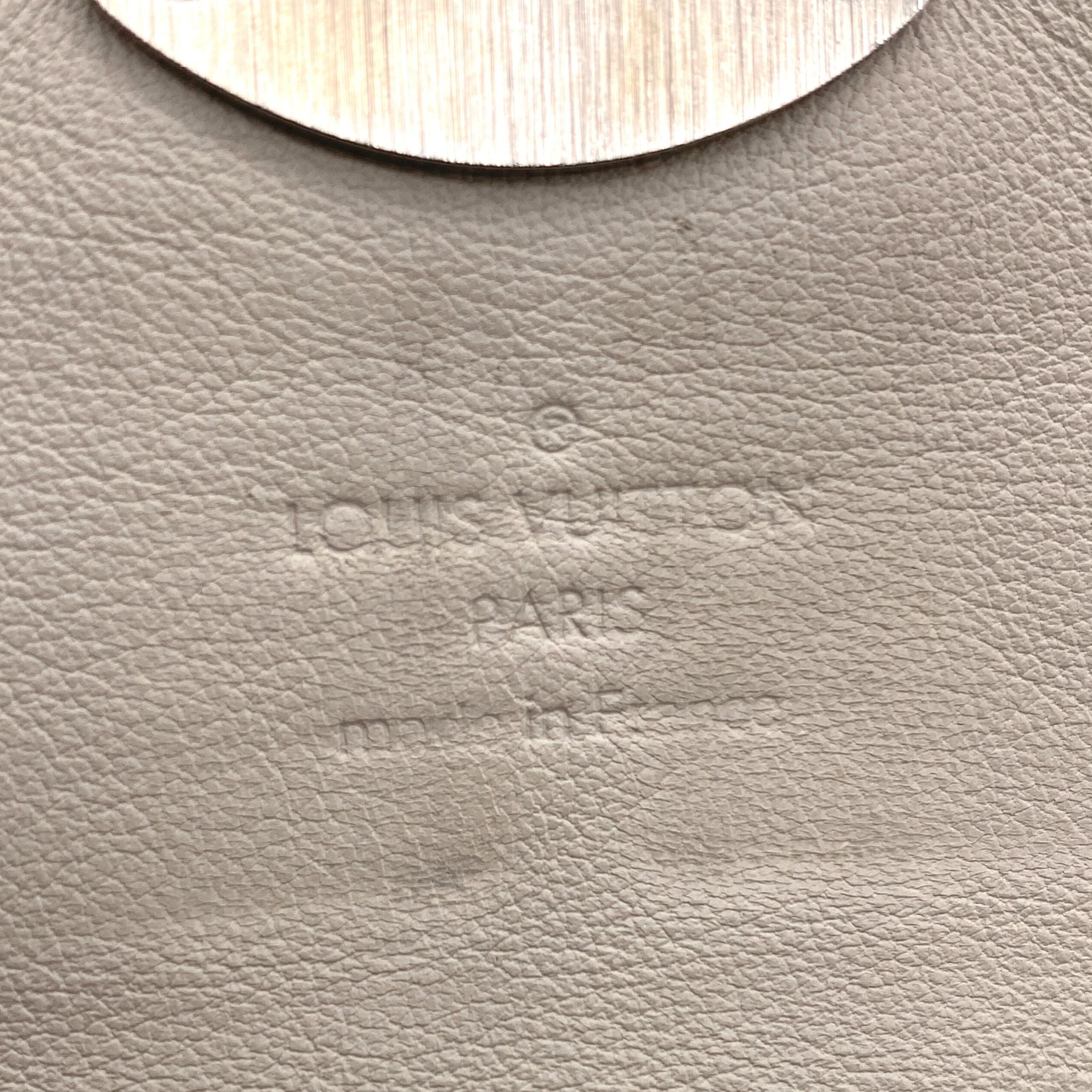 Louis Vuitton Black Mahina Leather Iris XS Wallet at 1stDibs